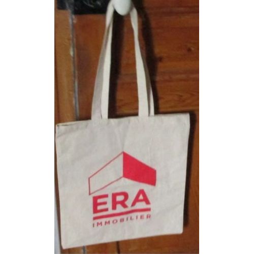 Sac d'appoint 100%coton label Oeko-Tex fabriqué par Impacto-36x42cm avec 2 anses d'environ 34cm-couleur écru avec grand logo publicitaire ERA en rouge sur une face-dos uni