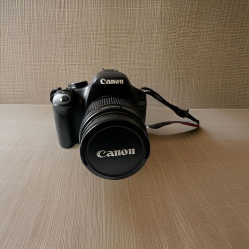 Canon EOS Rebel T1i 15.1 Mpix + Objectif Canon EF-S 18-55mm f/3.5-5.6 IS II - Noir