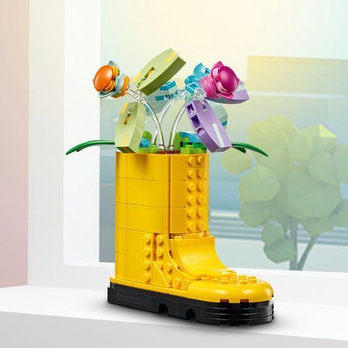 Botte de pluie avec des fleurs
