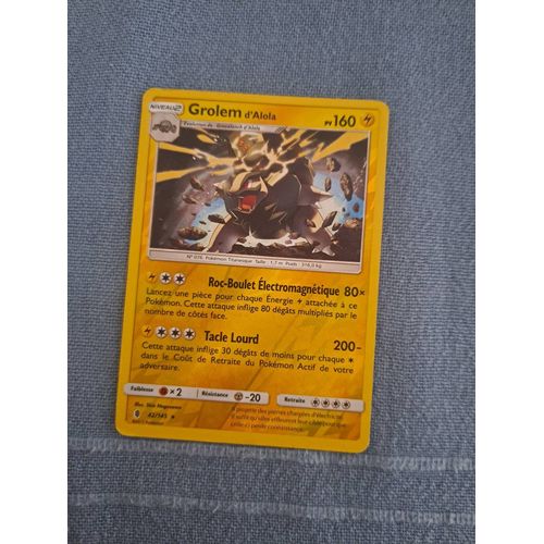 Une Carte Pokémon De Grolem D'alola