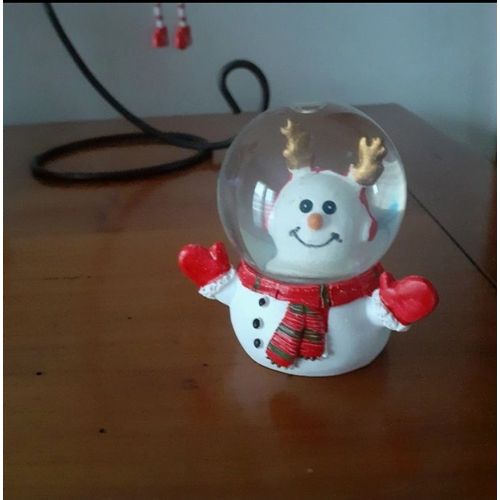 Boule à neige Bonhomme de neige avec cache-oreilles
