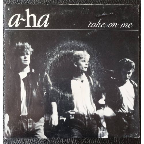 A-Ha - Take On Me (3'48) + Love Is Reason (3'04) - 1985 Warner Bros 92 9006-7 France Sp/45rpm/7" - Boutique Axonalix