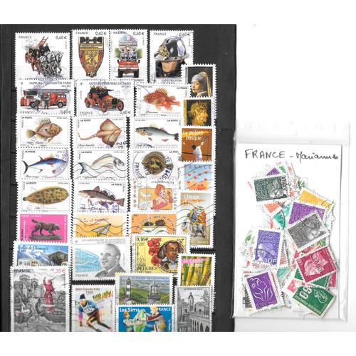 Lot De 33 Timbres De France Oblitérés, Plus Une Pochette De Mariannes