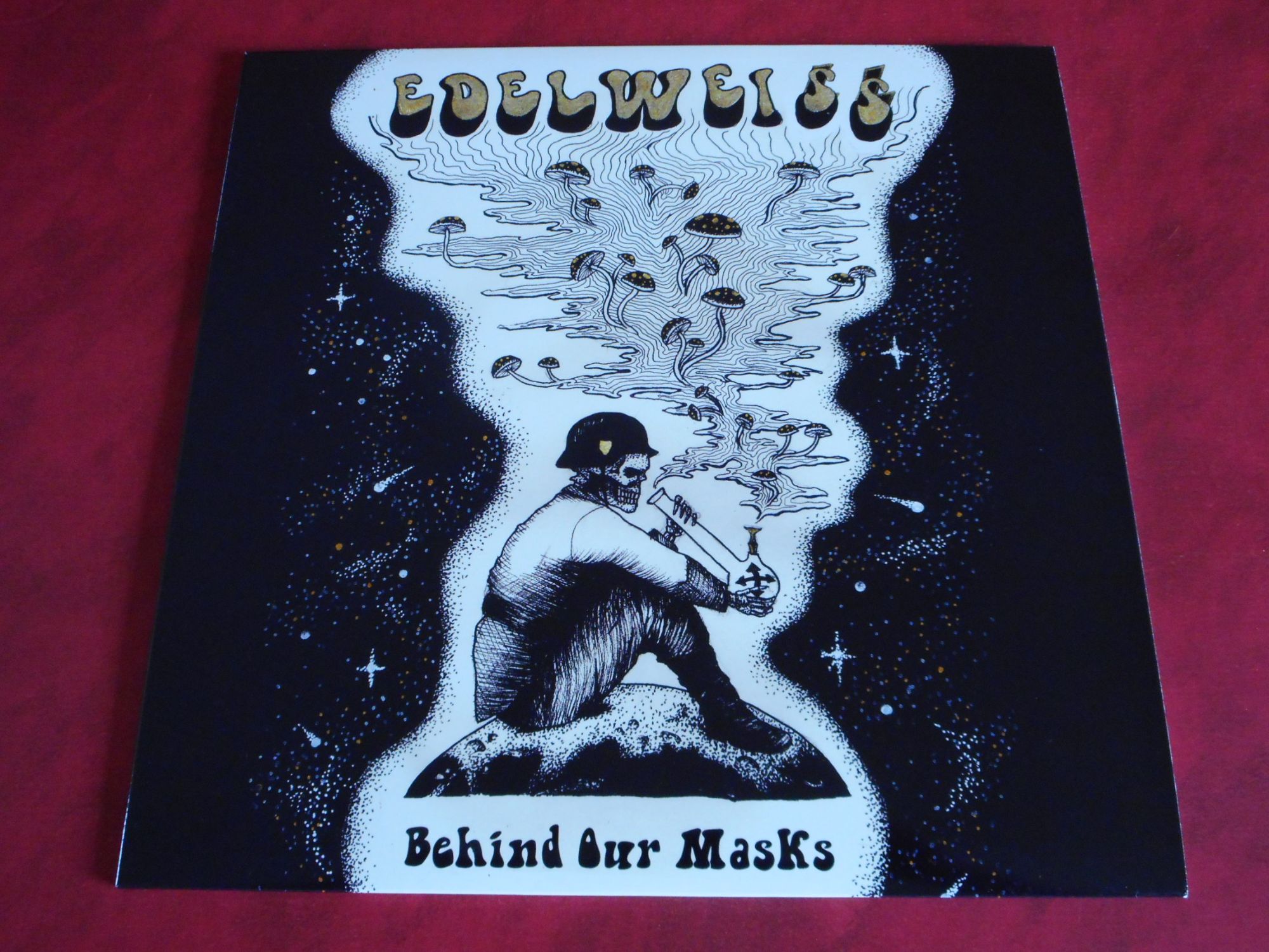 Edelweiss (Assassination, Black Magick Ss, Behrosth, Vothana, Vampyress, Bilskirnir, Coven, Peste Noire) - Behind Our Masks (Edition 100 Exemplaires, Vinyle 180gr Doré, Face B Gravée)