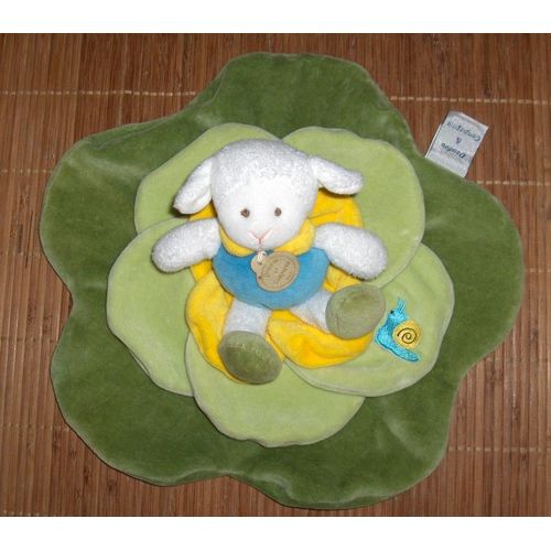 Doudou Mouton Sur Feuille Et Fleur Jaune