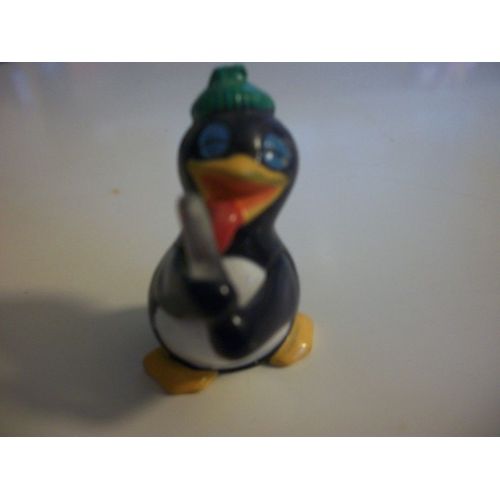Pingouin Qui Lèche Un Baton De Glace