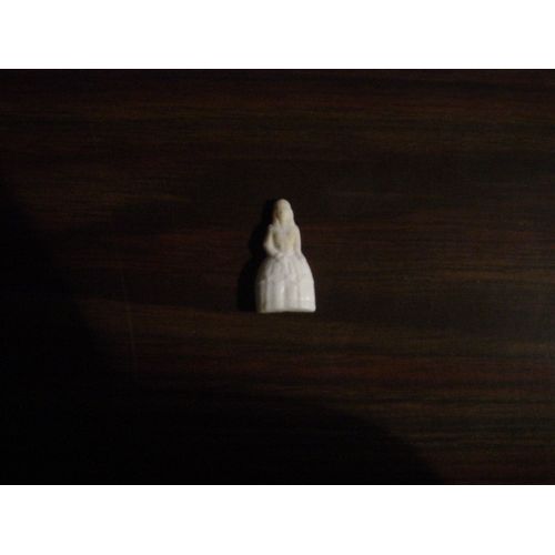 Fève Plastique Femme