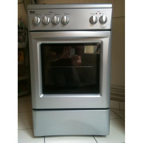 Faure CVC 4076S - Cuisinière vitrocéramique - 4 foyers radiants - Four à nettoyage par catalyse - Gris métallisé - L: 50 H: 86 P: 60(meuble) ou 66(incluant poignée)