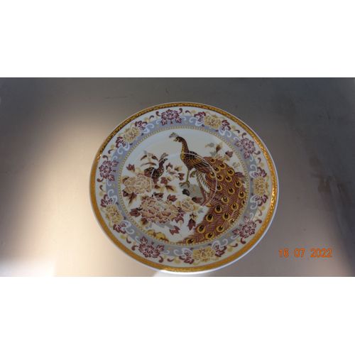 Tasse Et Soucoupe En Porcelaine.