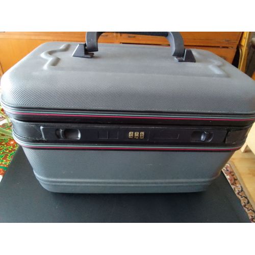 Vanity case grise, rigide, et son miroir. 37cmx23cm Hauteur 23cm.