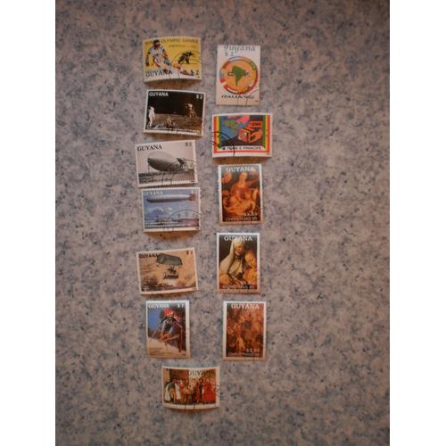 Lot De 12 Timbres Guyana, Thèmes Divers : Conquete De L'air, Jo, Espace...