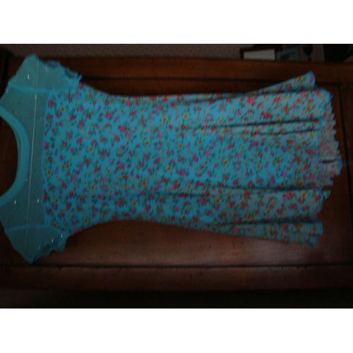 Tunique De Patinage Artistique Sagester Taille S Soit 10/12 Ans Forme Robe Fleurie À Fleurs Rose Et Jaunes Sur Fond Bleu Turquoise À Manches Courtes