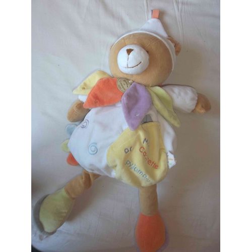 Peluche Doudou Et Compagnie Range Pyjama Ours Ma Cachette À Pyjama Blanc Avec Pétales Jaune Orange Vert Mauve Bonnet 55 Cm