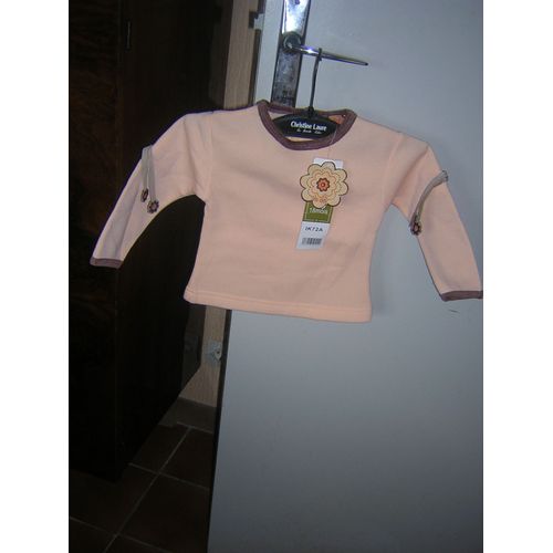 Pull Baby Doll 18 Mois. 55% Polyester 15% Coton.