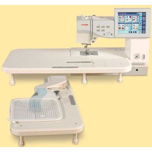 Machine à coudre et à broder Janome 11000