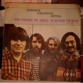 Run Through The Jungle/ Up Around The Bend