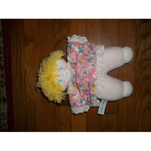 Doudou Poupee Sucre D Orge Robe Fleurie Rose