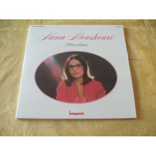 Album 2 Disques 24 Titres .