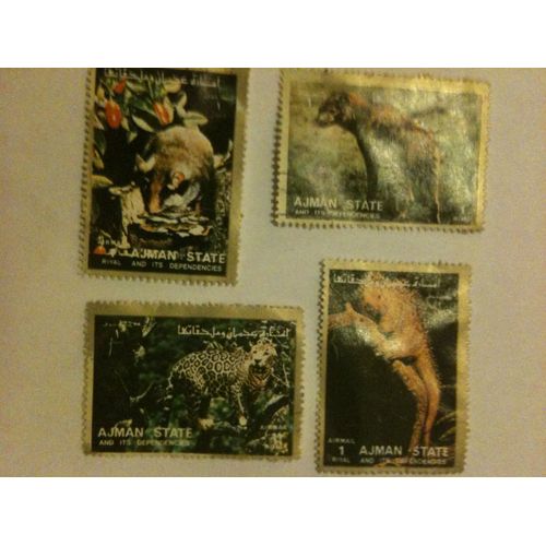 Lot De 4 Timbres Animaux Exotiques Ajman State