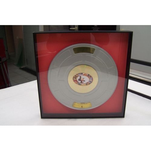 Disque D'or "Les Plus Grands Musique Des Films De Walt Disney"