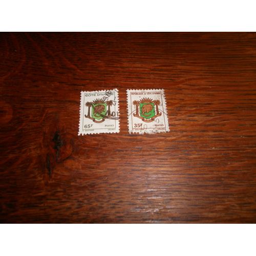 2 Timbres De Cote  D' Ivoire Oblitérés De 1976.  Armoiries.