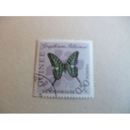 Timbre "Guinée :Graphium Policenes".