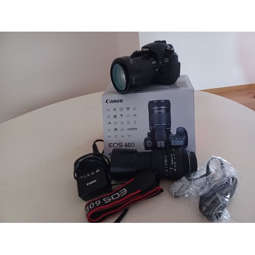 Canon eos 60D 18 mpix + Objectif zoom 18/ 135 canon + Objectif zoom 55 /200 sigma avec batterie , lanire, cbles