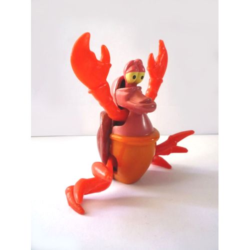 Le crabe Sébastien La petite Sirène Le mécanisme à remontoir fonctionne, le crabe se déplace sur