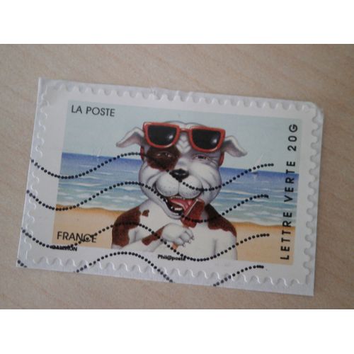 Timbre Oblitr Reprsentant Un Chien Mangeant Une Glace.