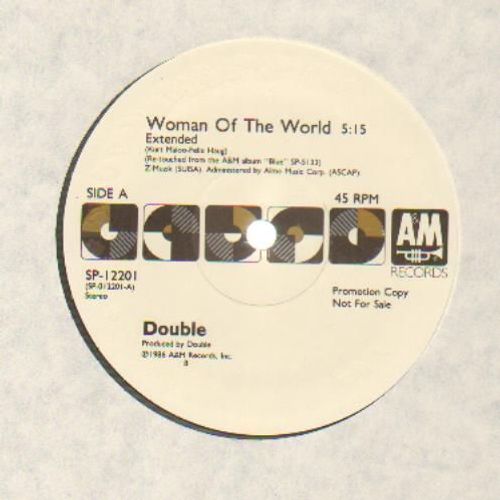 Woman Of The World (Re-Touched) (Promo - Transparent Dark Olive Vinyl)[Promo - Transparent Dark Olive Vinyl] - Double