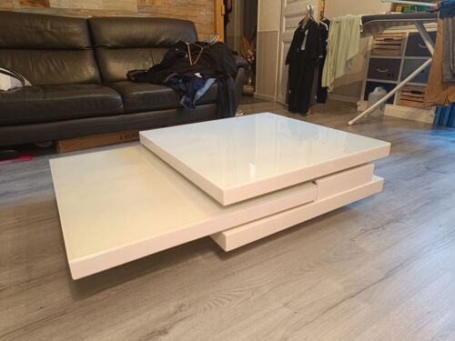 Table basse pivotante blanche en verre et plastique