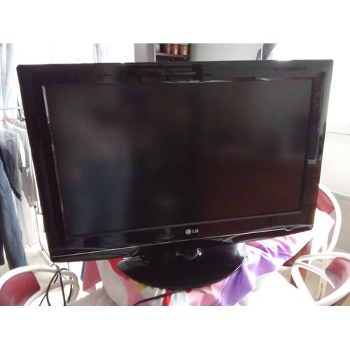 Télévision LG, 80 cm, plateau rotatif, télécommande d'origine