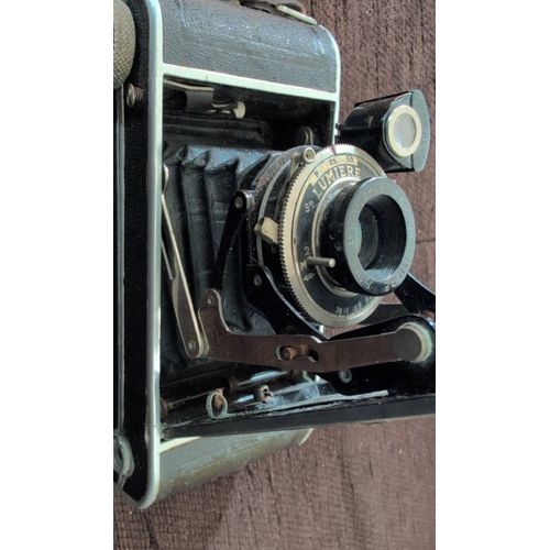 Appareil photo ancien lumière