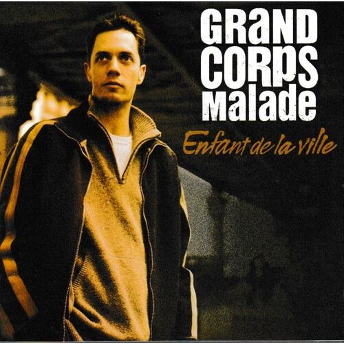 Grand Corps Malade Enfant De La Ville. Cd De 18 Titres Dont 2 Bonus. (P) 2007 ®Anouche Productions Az © Jean Rachid ®Universal Music Ed. ®Raoul Breton Made In E.U. «2ème Edition» Cd Rare Limité Epuisé