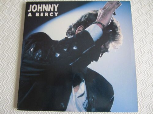 Johnny À Bercy : Rock' N Roll Attitude - Mon P'tit Loup - Laura - Que Je T'aime - Je Te Promets - Ma Gueule - L'envie - Gabrielle - Aimer Vivre - Quelque Chose De Tennessee - Etc...