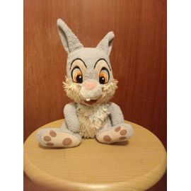 Doudou Panpan Disney, Coloris Gris, Beige, Gris, Blanc, Yeux Et Museau Brodés, Hauteur 28 Cm, Largeur 18 Cm.