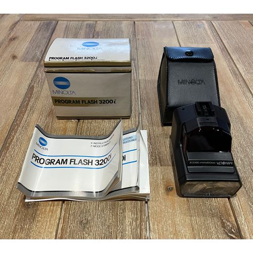 Minolta Program Flash 3200i + étui en cuir + boîte d'origine + mode d'emploi