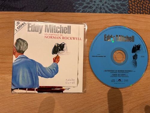Eddy Mitchell Cd Rare 2 Titres " Un Portrait De Norman Rockwell" Version Collector Titre En Rouge Sur Deux Lignes