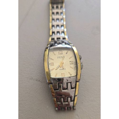 Montre Fen Doree Et Argentee