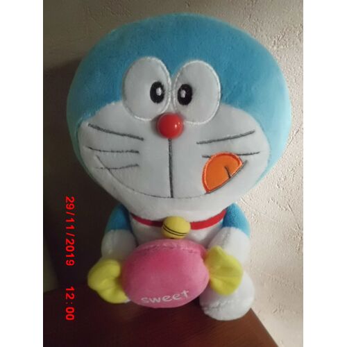 Chat Doraemon Avec Son Bonbon