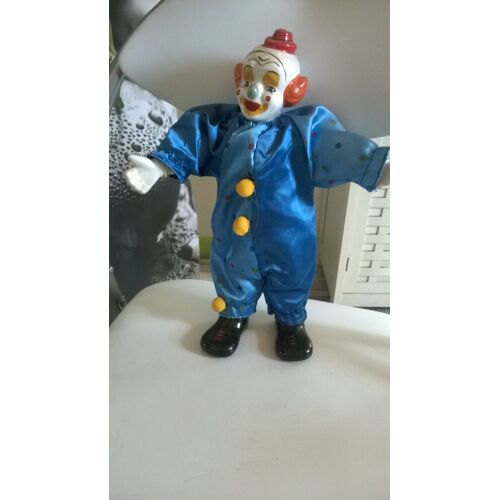 Clown bleu en porcelaine articule