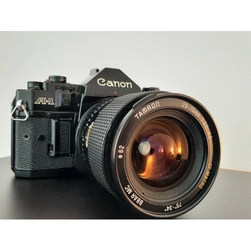 Canon ae-1 program + zoom 35-70mm f/3.5-4.5 fd + pile neuve à Rennes