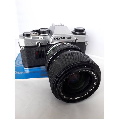 OLYMPUS OM10 +ZOOM ZUIKO 35-70 F4 constant +notice+piles+dragonne