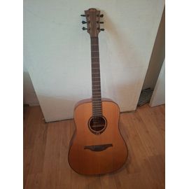 Guitare Lag T200d, En Bon État. Quelques Légers Coups Sur Le Corps Mais Rien De Grave En Soi Ou Qui Change La Sonorité De L'Instrument. Prévoir Le Changement Des Cordes. Acheté + 300 Euros.