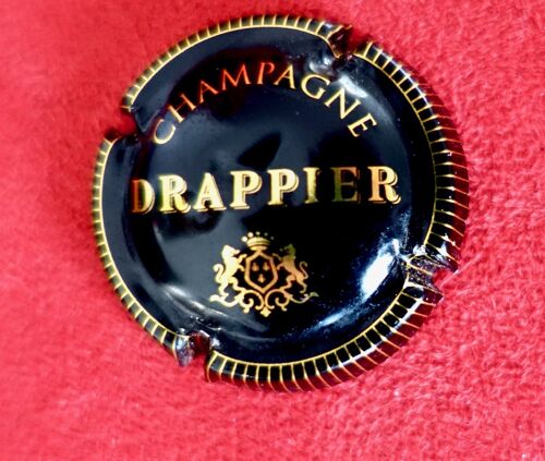 Capsule Champagne Drappier. Noir Et Or, Bords Striés.