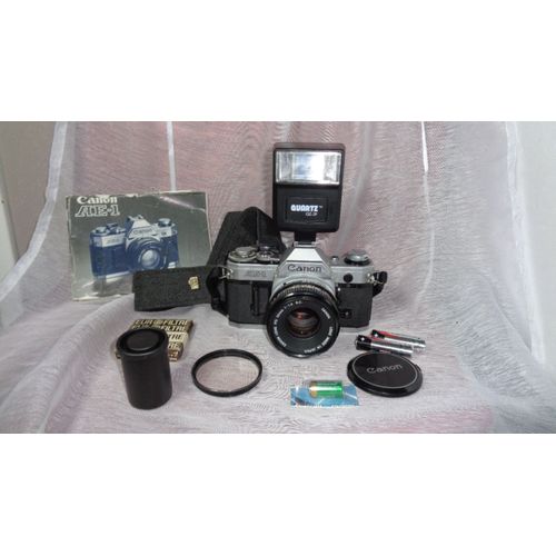 canon ae-1 + objectif 50 1:18 excellent etat de fonctionnement ( + en cadeau gratuit 1 kit de demarrage )