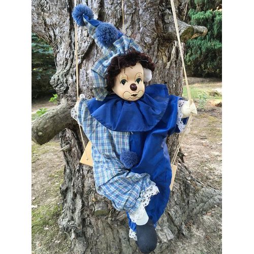 vintage : ancien clown sur balancelle