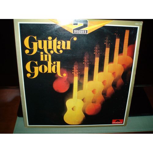 Guitar In Gold .