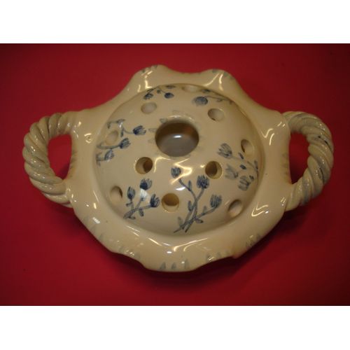 Jolie vase à trous pique fleurs