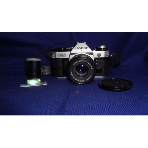 canon ae-1 program + objectif 50mm 1:.8 + pellicule 35 mm fonction ok